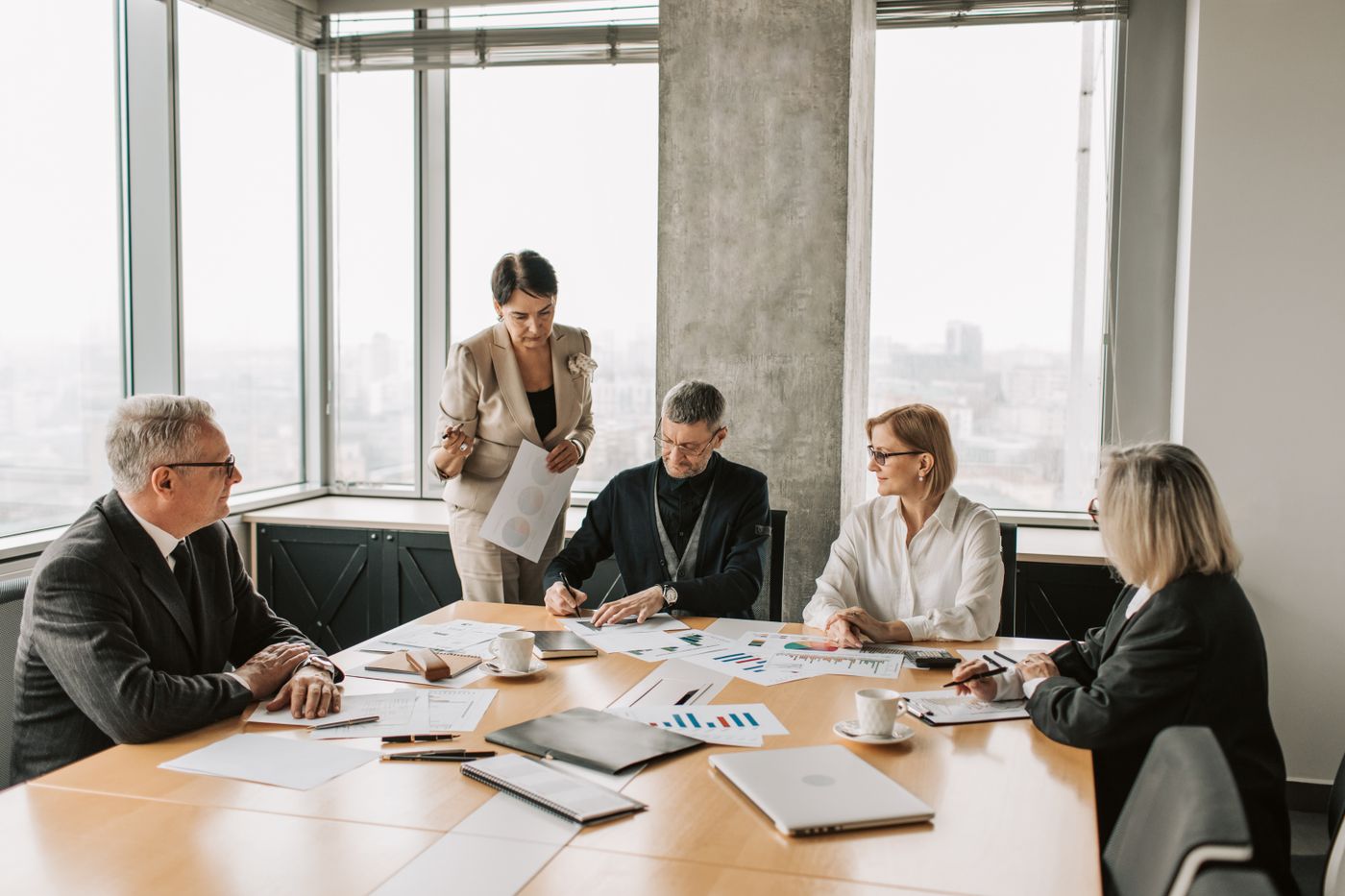 Illustrative professional discussion in a bright office