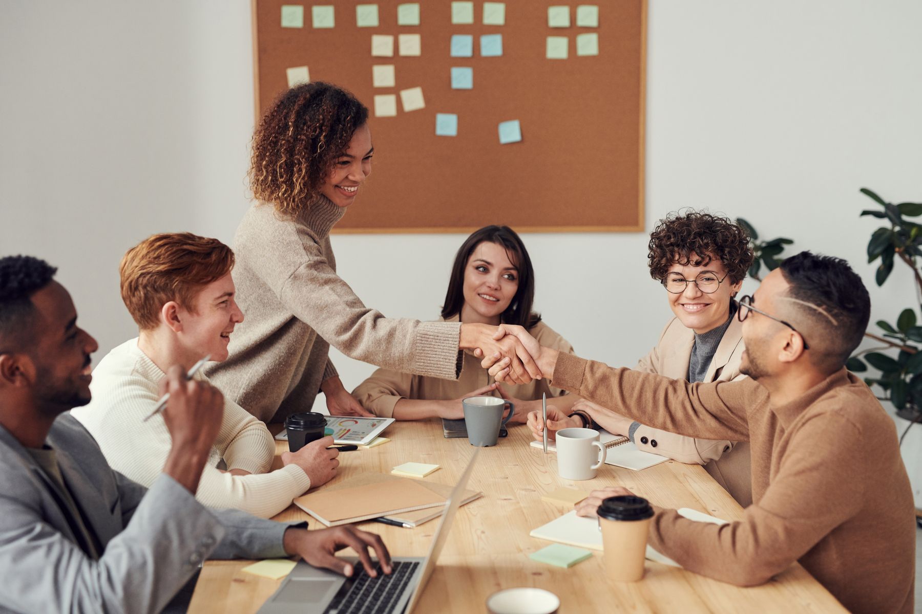 Illustrative photograph of professionals reviewing financial information